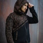 A fusion of tradition and streetwear—this handcrafted hoodie from TribalDesert features intricate tribal patterns