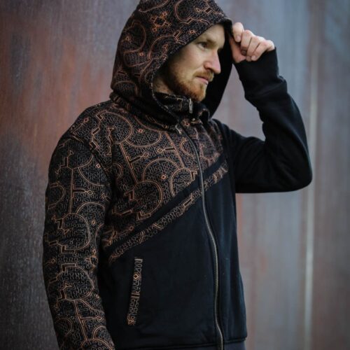 A fusion of tradition and streetwear—this handcrafted hoodie from TribalDesert features intricate tribal patterns