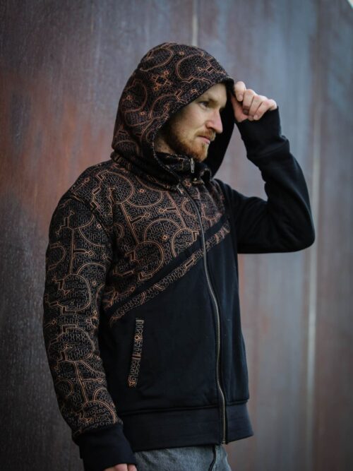 A fusion of tradition and streetwear—this handcrafted hoodie from TribalDesert features intricate tribal patterns