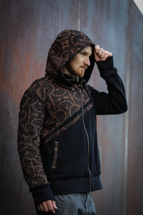 A fusion of tradition and streetwear—this handcrafted hoodie from TribalDesert features intricate tribal patterns
