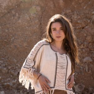 Poncho de flecos lunares