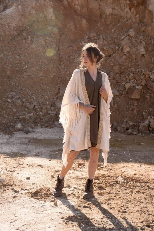 Layer up in effortless boho style with this TribalDesert handwoven kimono
