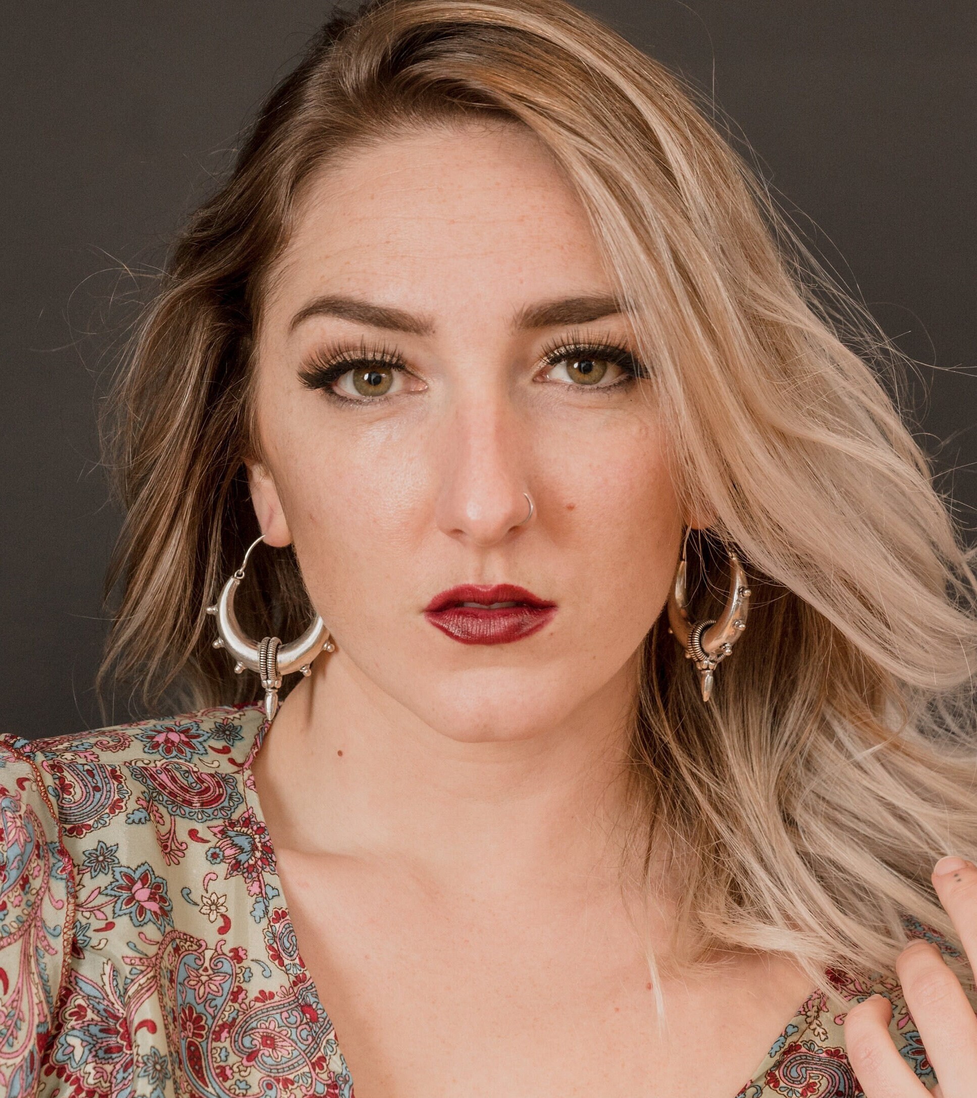 Bold and mystical, these handcrafted brass crescent moon earrings from TribalDesert feature intricate detailing inspired by ancient tribal symbolism