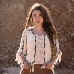 Poncho de flecos lunares