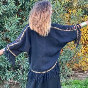 Poncho de flecos lunares