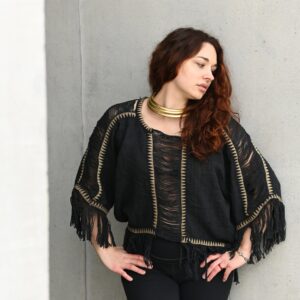 Poncho de flecos lunares