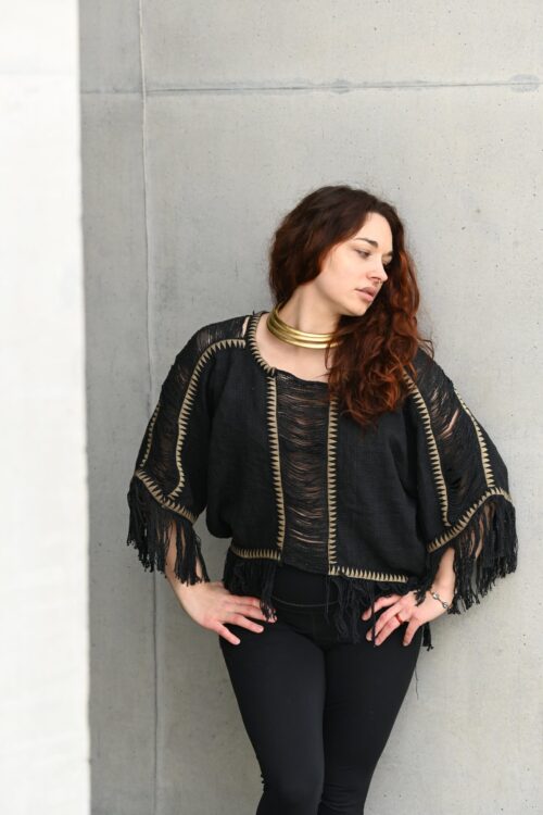 Poncho de flecos lunares