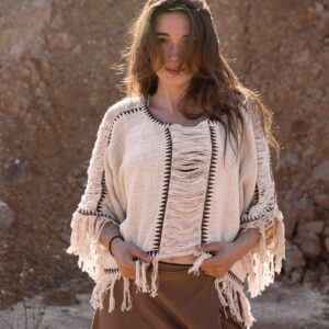 Poncho de flecos lunares