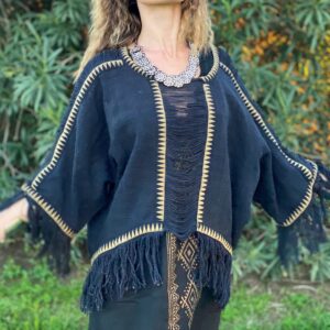 Poncho de flecos lunares