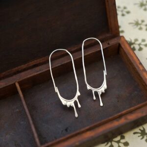 Schmelzende Ohrringe