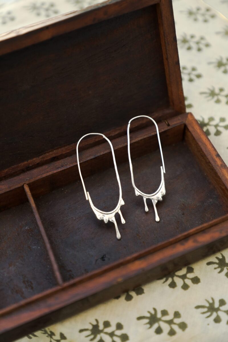 Schmelzende Ohrringe