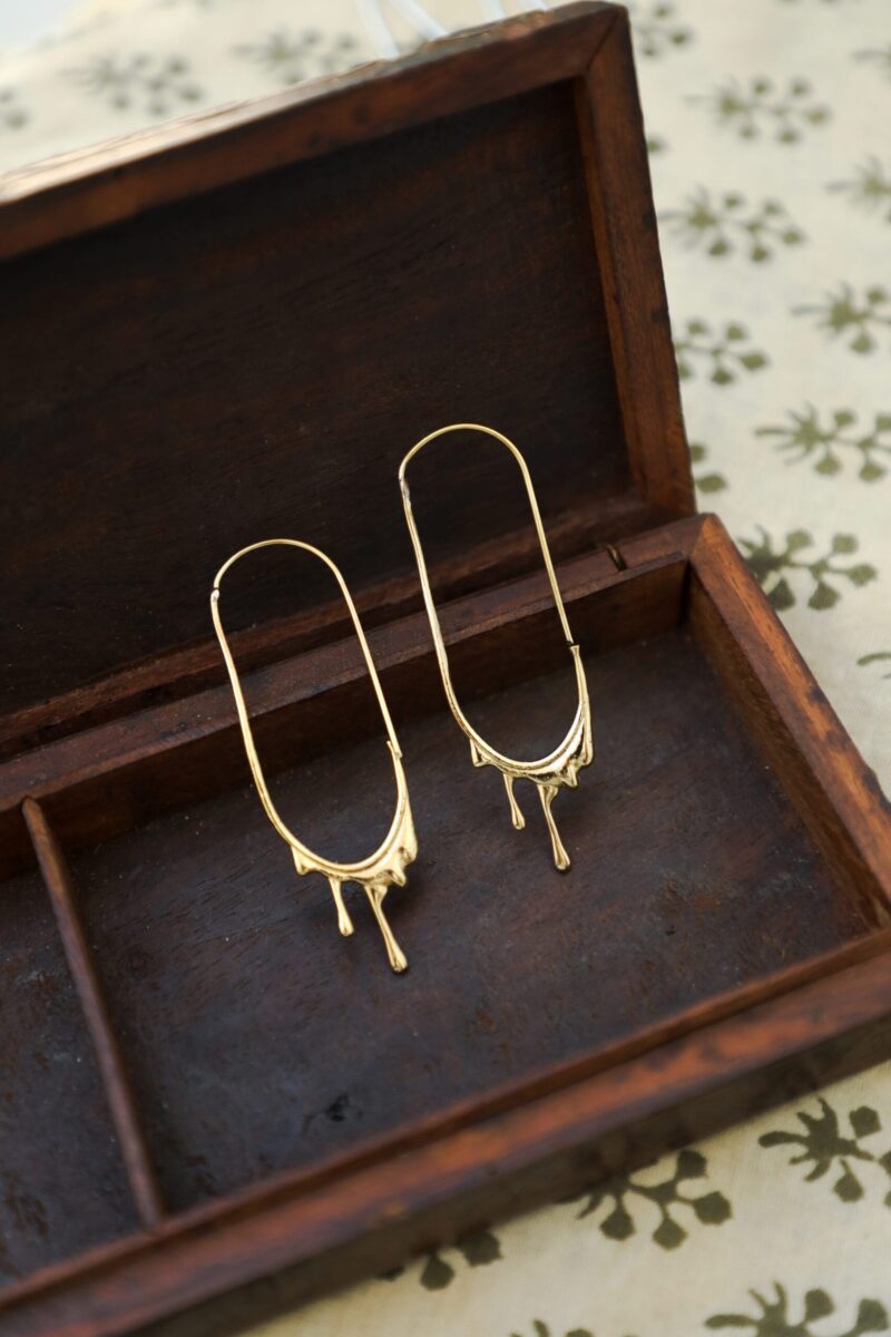 Schmelzende Ohrringe