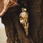 Pendentif tête de mort d’oiseau